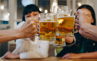 Group Of Happy Tourist Young Asia Friends Drinking Alcohol Or Cr